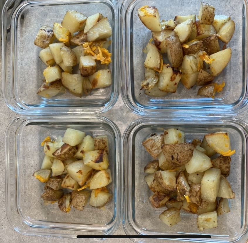Four separate containers with potatoes