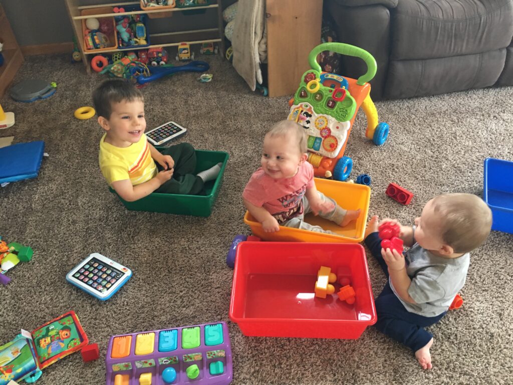 Twins and 3 year old playing
